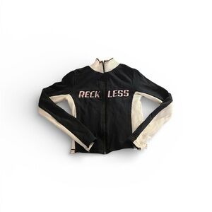 Subdued RECKLESS tight fit sweater